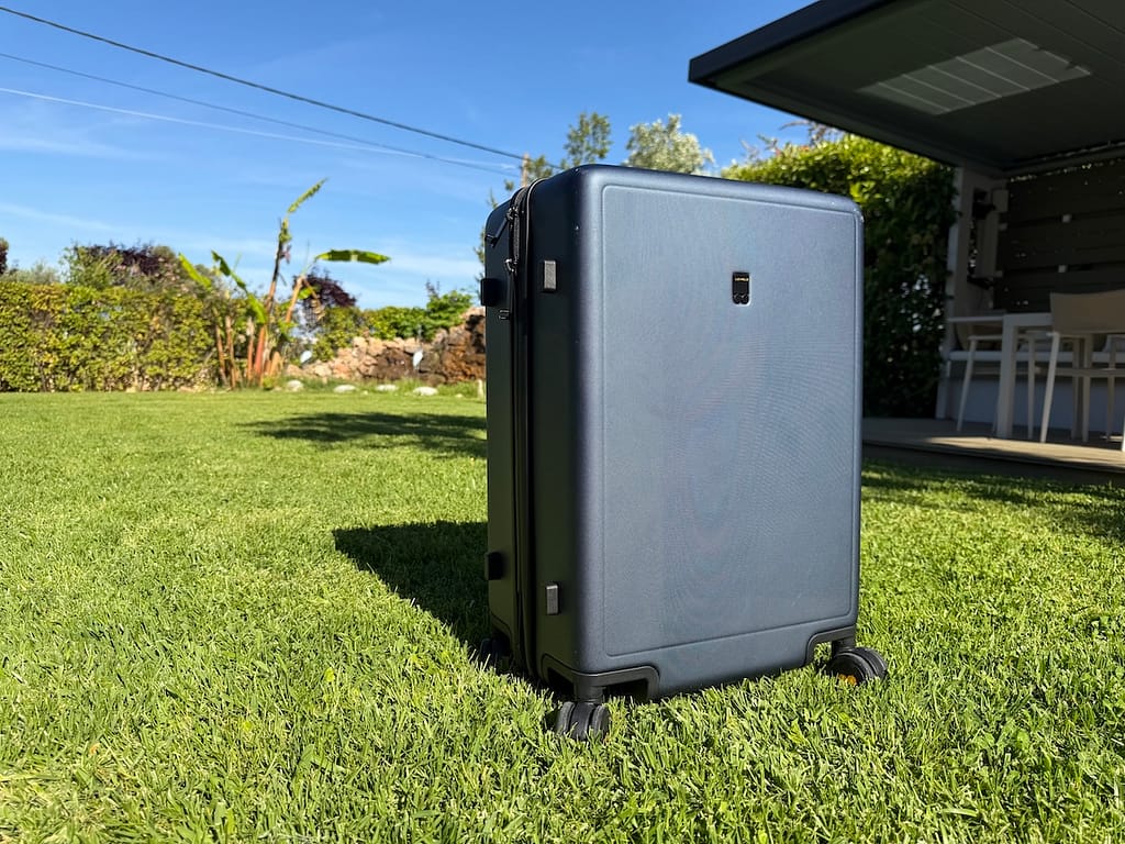 Picture of the Level8 Suitcase sitting on grass