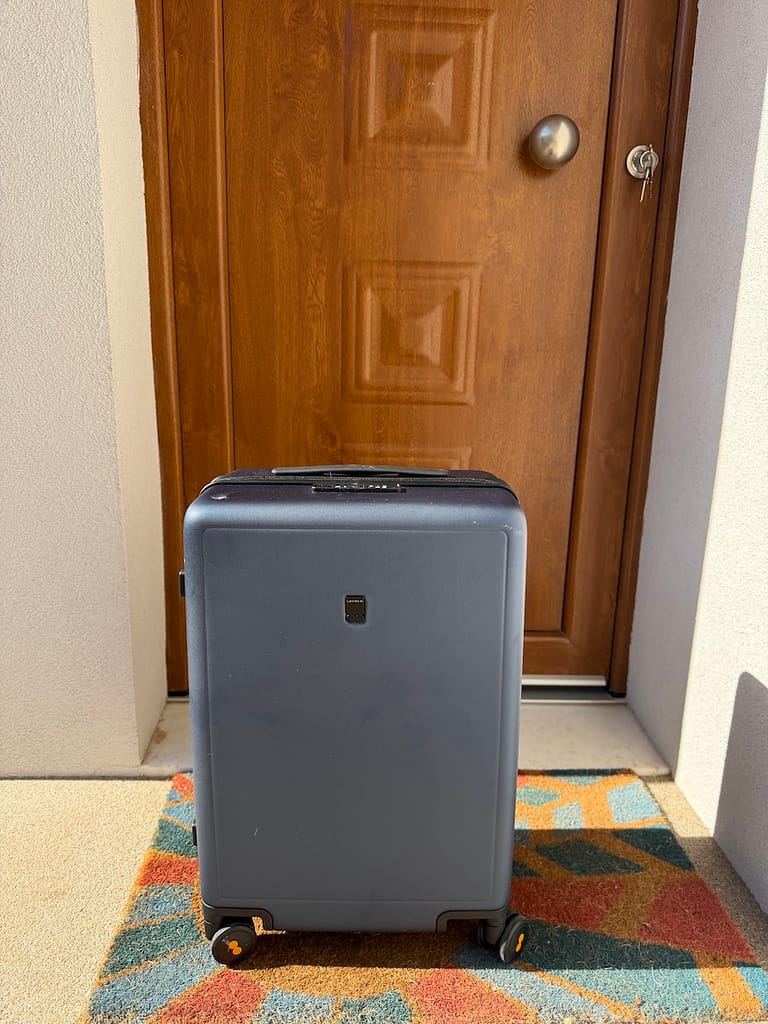 The Luminous Textured Carry-On suitcase wheels along on almost every surface