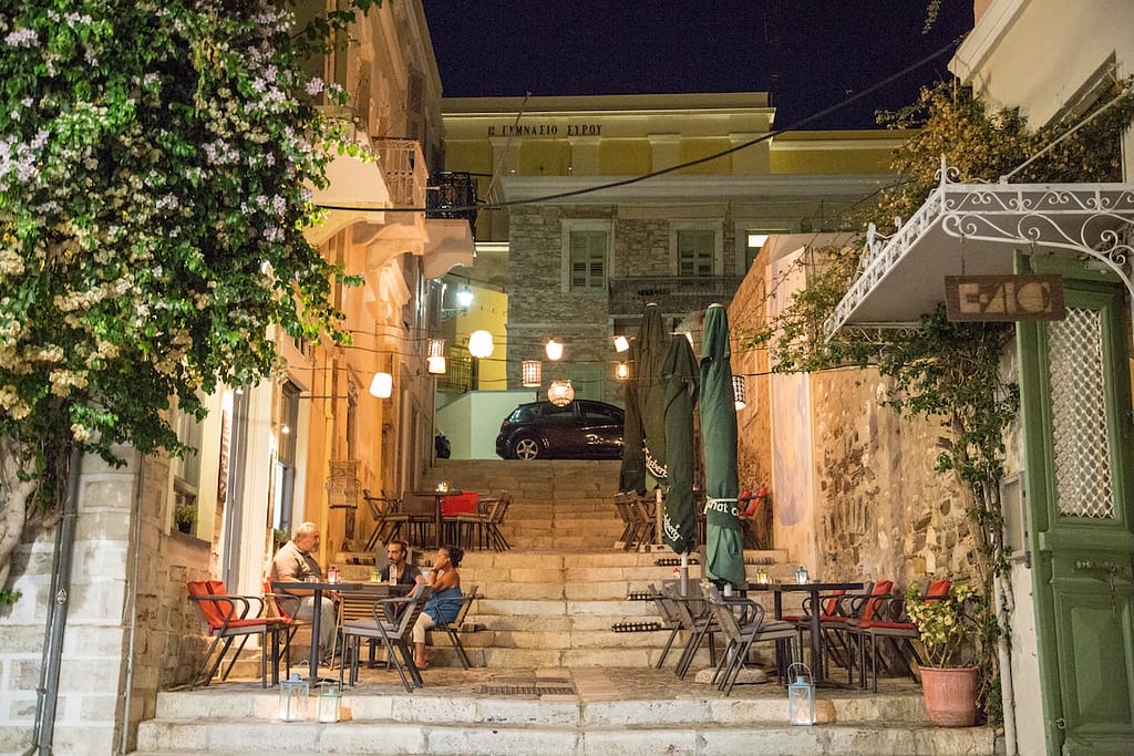 Patrons at the bar on the steps of Ermoupolis, near Miaouli Square.
