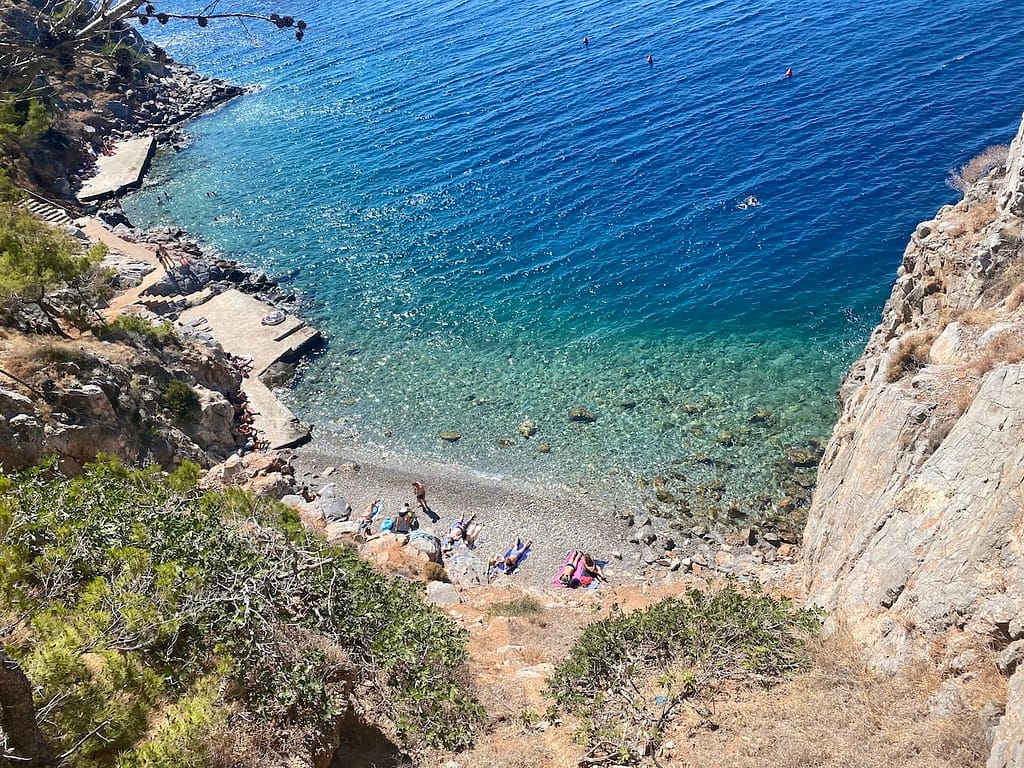 If you don't want to take a boat, walk to Avlaki Beach near the main town