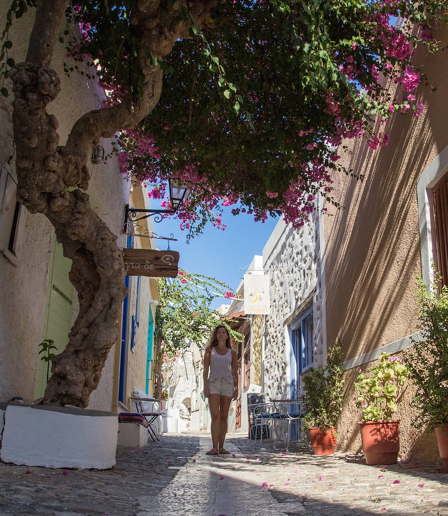 Girl exploring the alleys of Ano Syros.