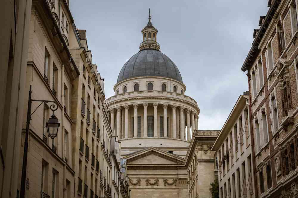 The Pantheon towering over the classic architecture and buildings of Paris.