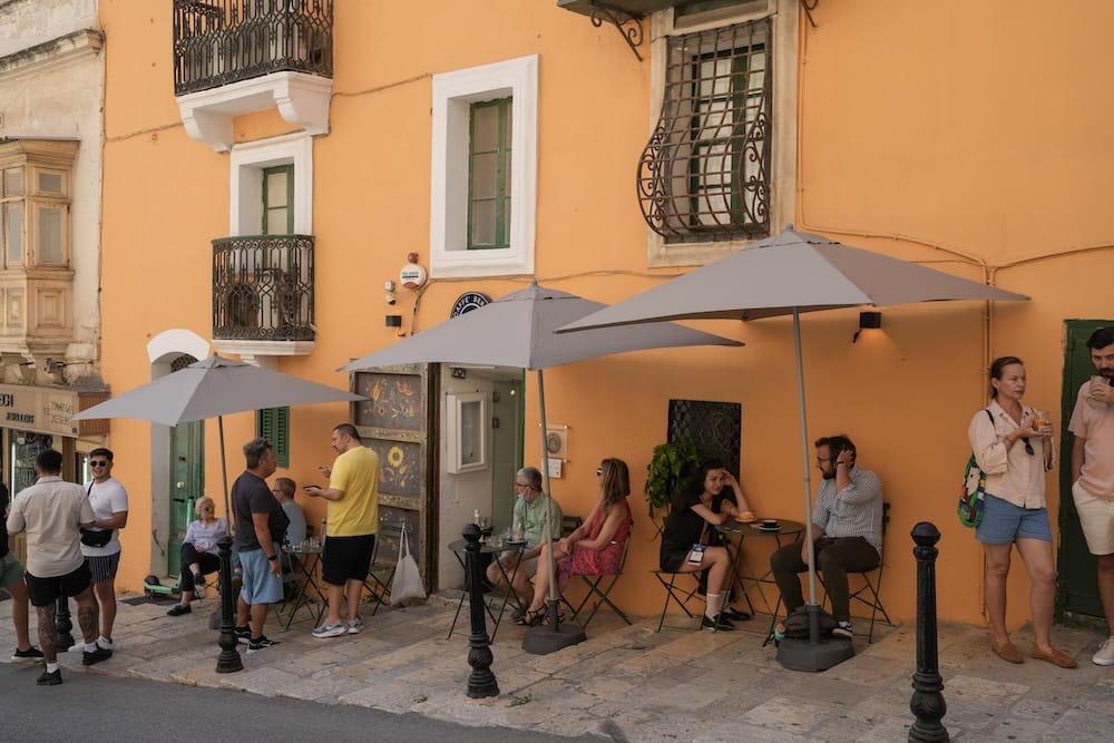 People socializing in Valletta