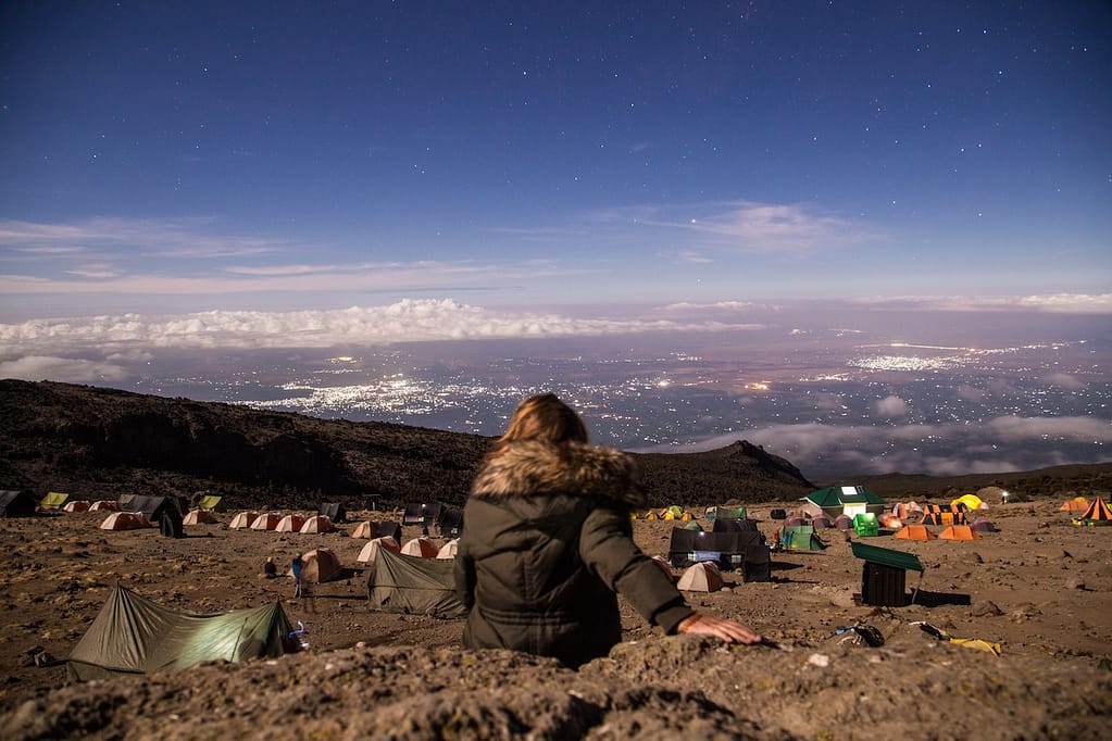 Making camp at Mount Kilimanjaro, overlooking the stars and Arusha below.