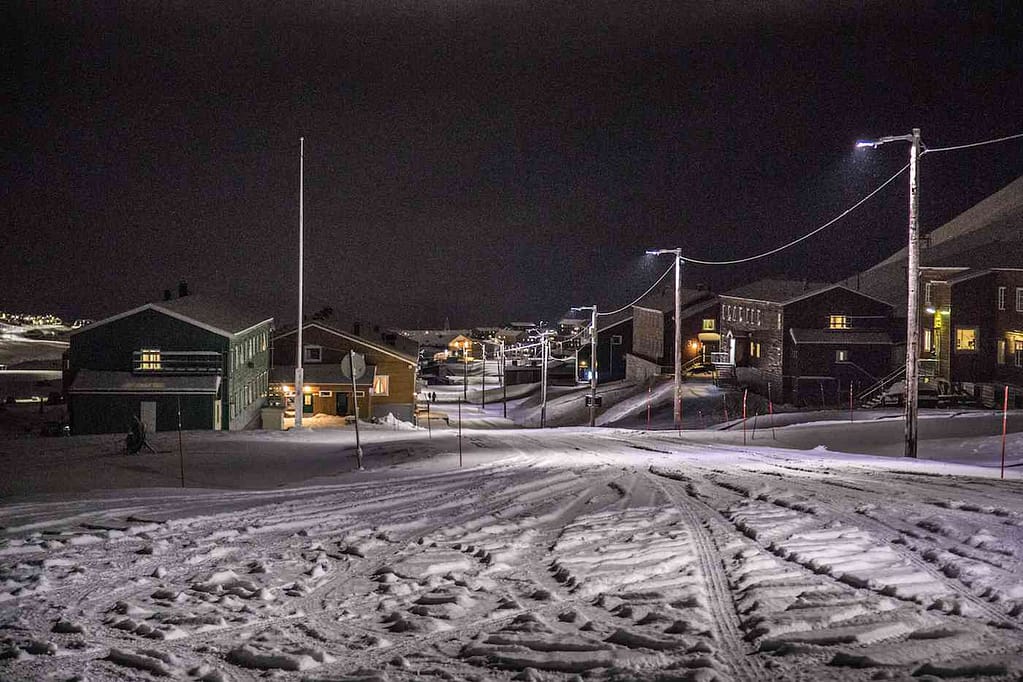 Street in Longyearbyen, Svalbard during polar night in the wintertime.