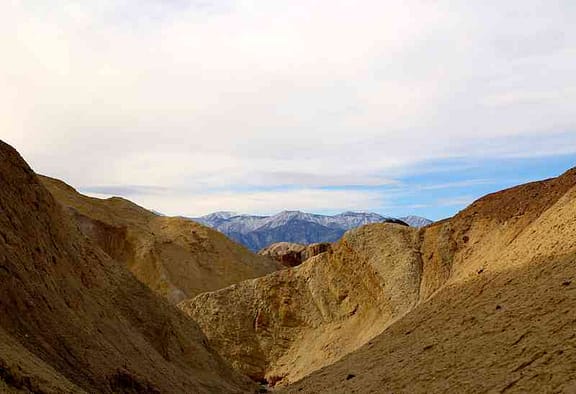 Snow-capped peaks behind the Death Valley desert