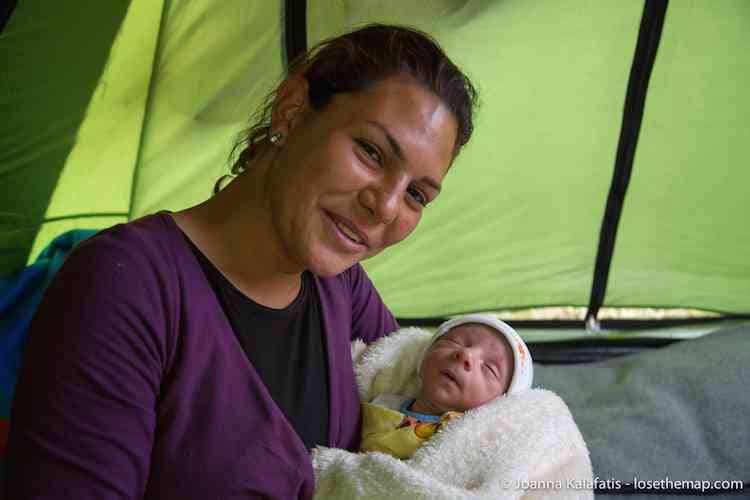 Namaya with her 8-old day newborn, born in the refugee camp.