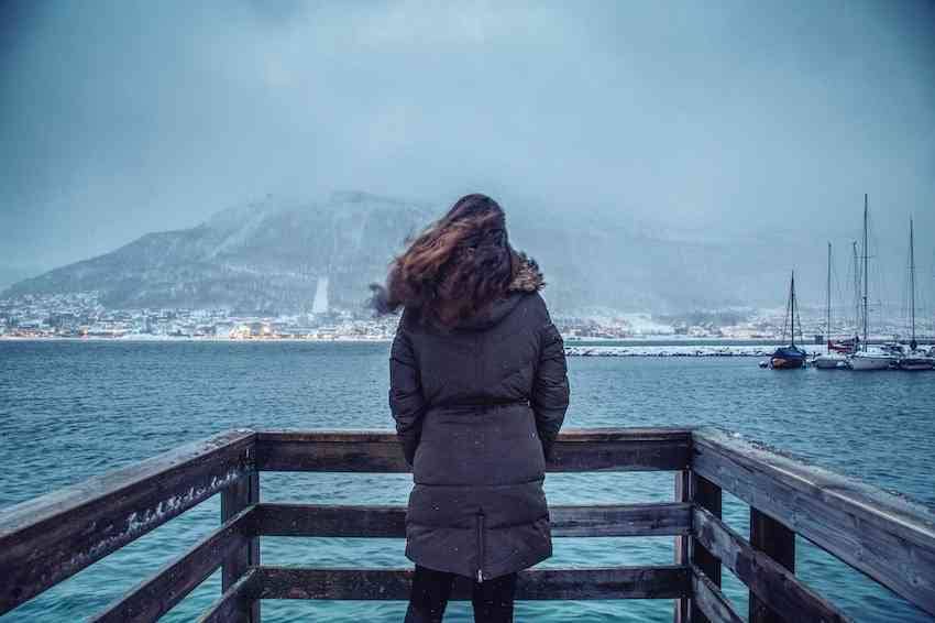 Looking out at Tromso with cold weather gear.